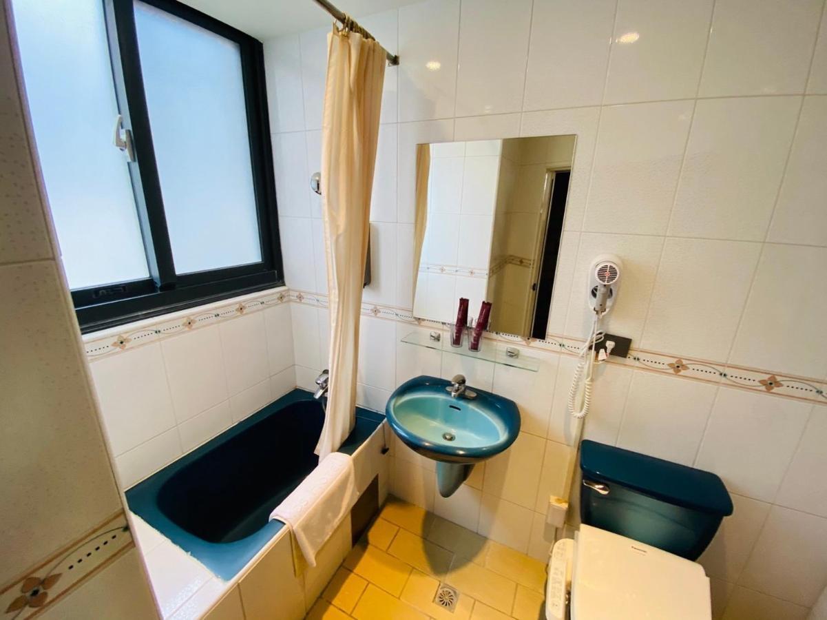 Dlinn Hotel Тайджун Екстериор снимка