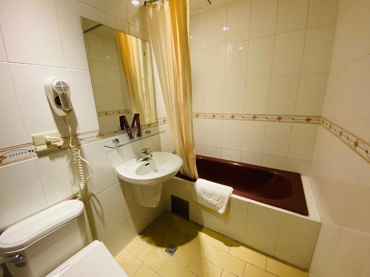 Dlinn Hotel Тайджун Екстериор снимка