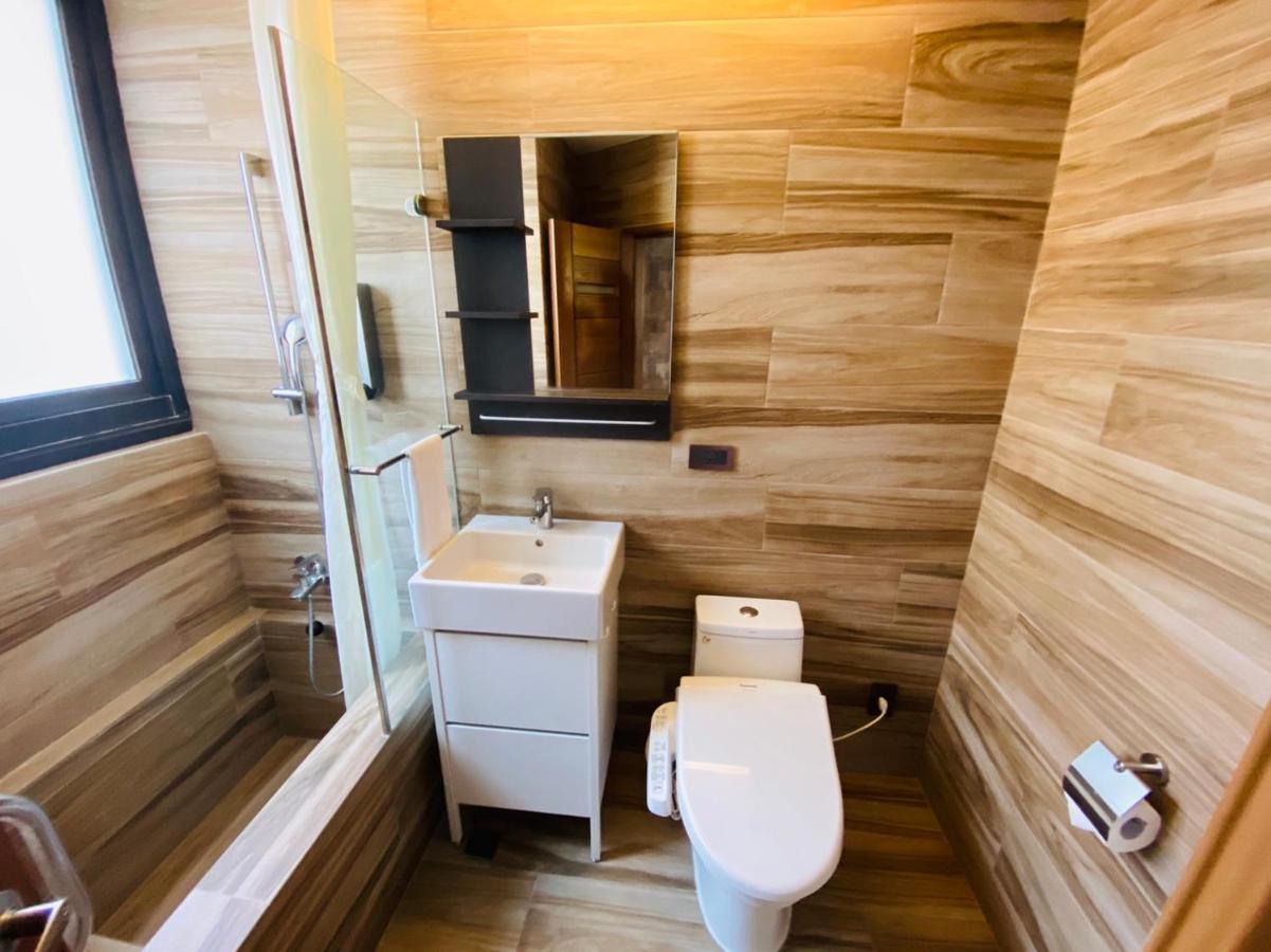 Dlinn Hotel Тайджун Екстериор снимка