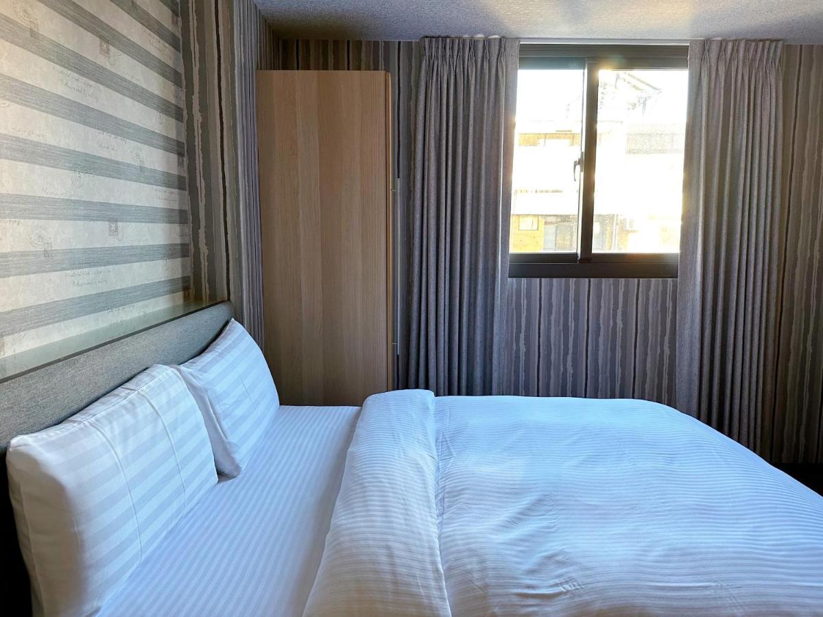 Dlinn Hotel Тайджун Екстериор снимка