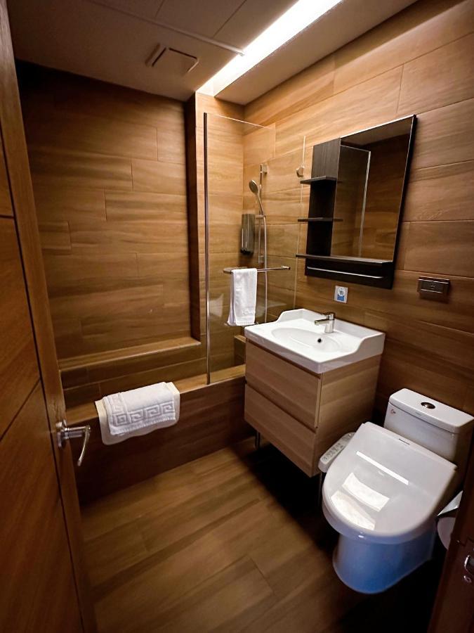 Dlinn Hotel Тайджун Екстериор снимка